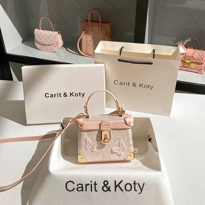 Elegant square handbag with floral butterfly lace design