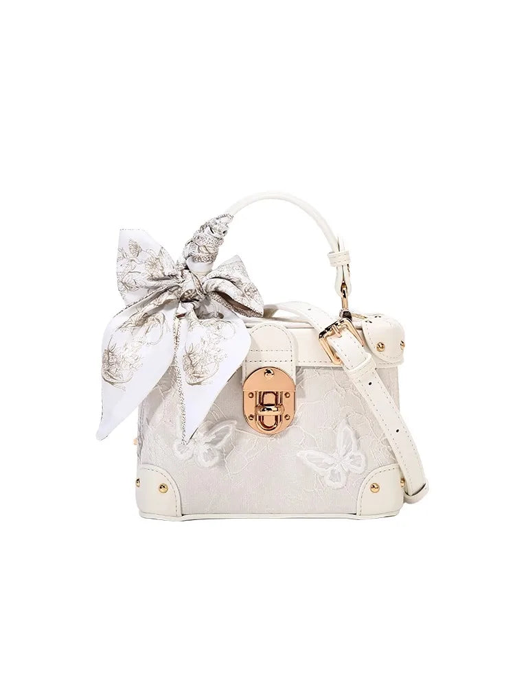 Elegant square handbag with floral butterfly lace design