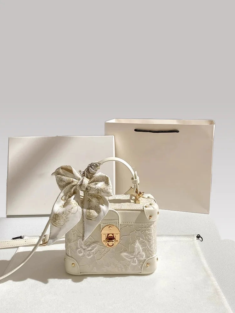 Elegant square handbag with floral butterfly lace design