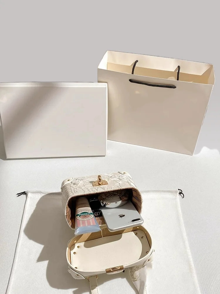 Elegant square handbag with floral butterfly lace design